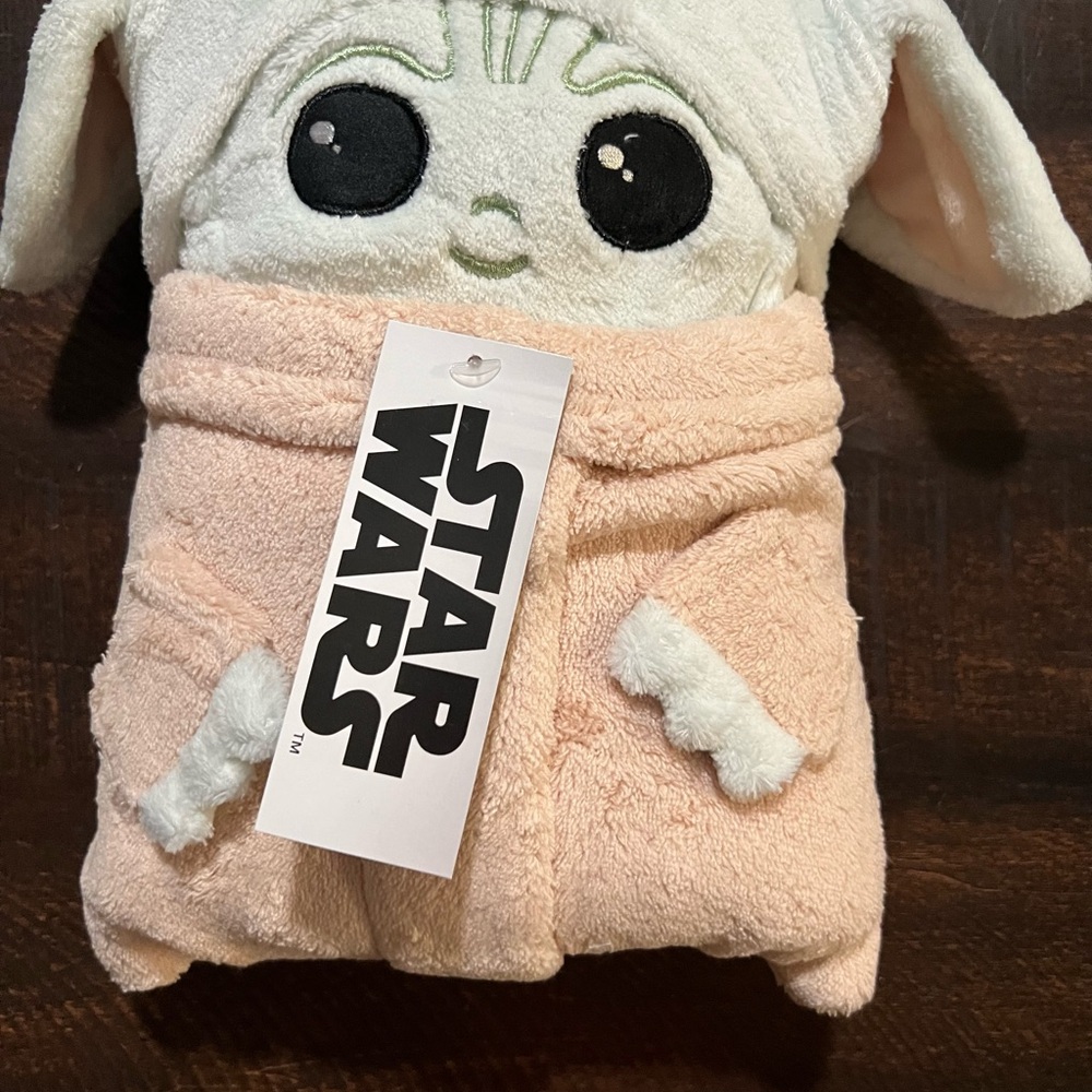 Star Wars stuffed Grogu, also known as "Baby Yoda, that converts to a blanket.